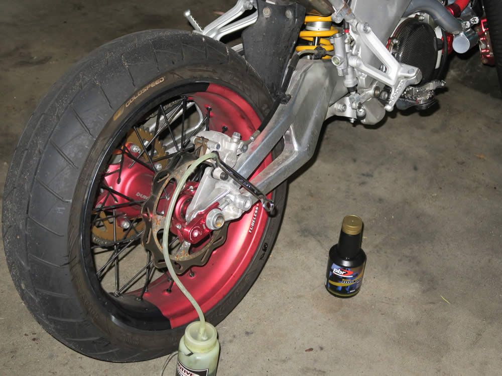 Spongy Rear Brake/Very little braking.