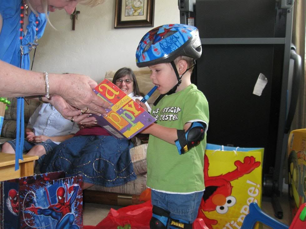 All decked out to ride his new big wheel