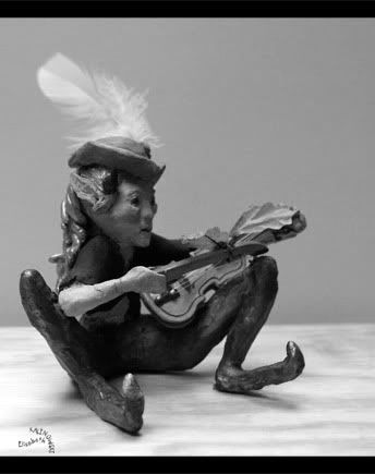 sculpture argile elfe lutin diablotin violon