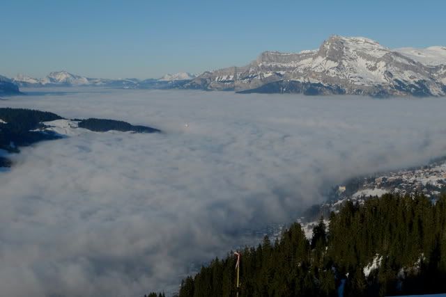 above the clouds, and aeroplane